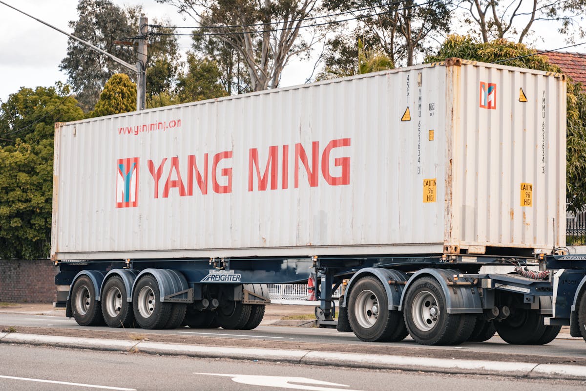 Flatbed truck with container